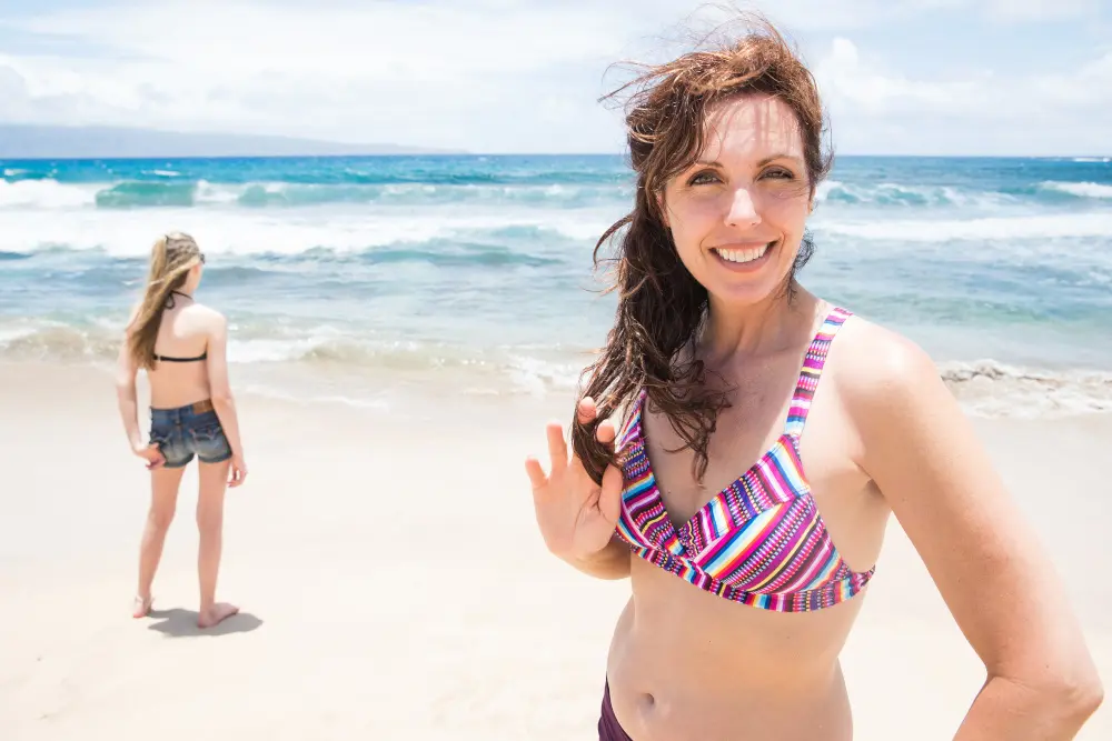 Mother and daughter on family vacation at tropical beach