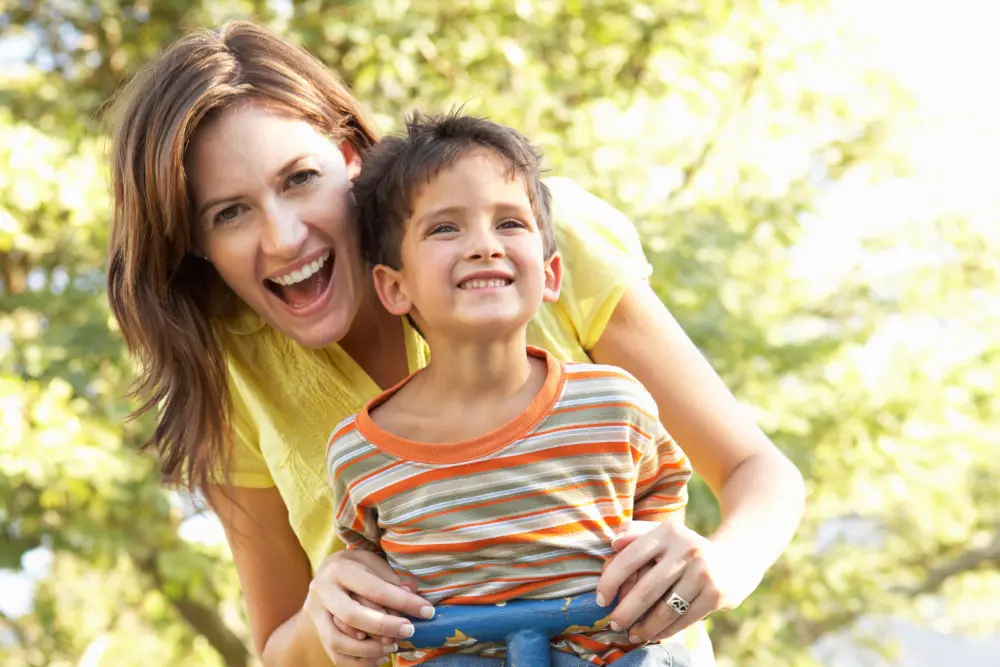 mom and son playing outside