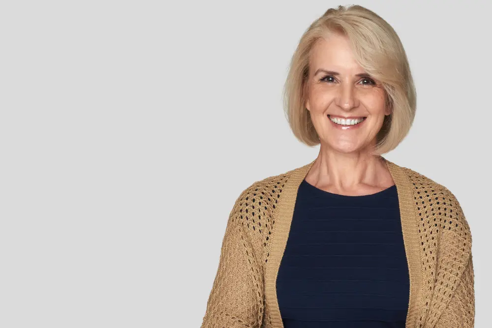 Beautiful old woman is smiling toothy