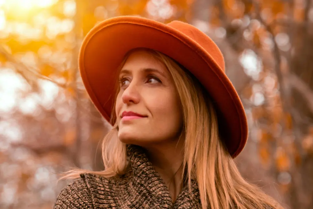 woman in large red hat