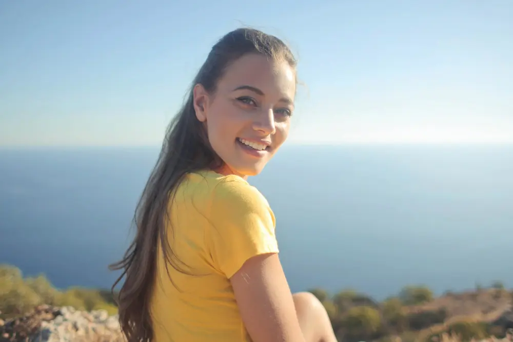 woman in yellow shirt