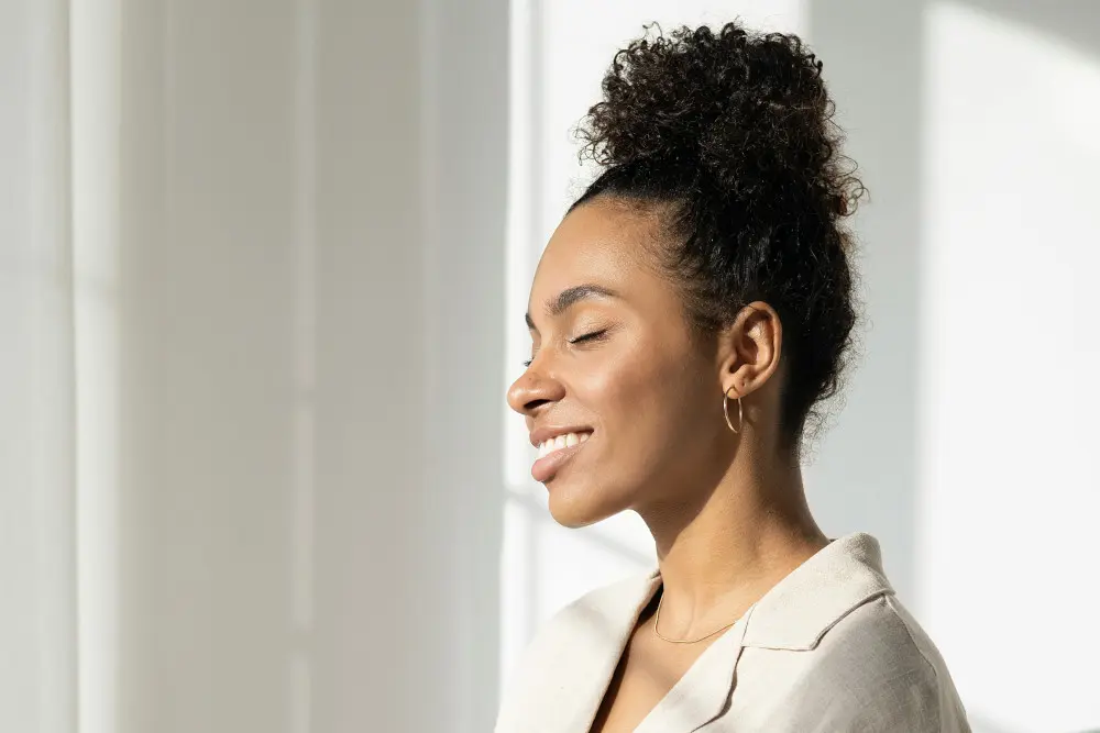 woman smiling in sunshine