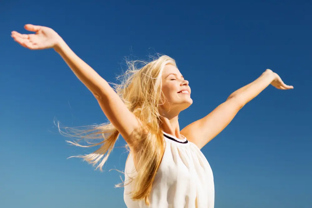 beautiful woman enjoying summer outdoors
