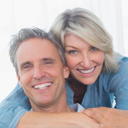 Couple smiling at the camera